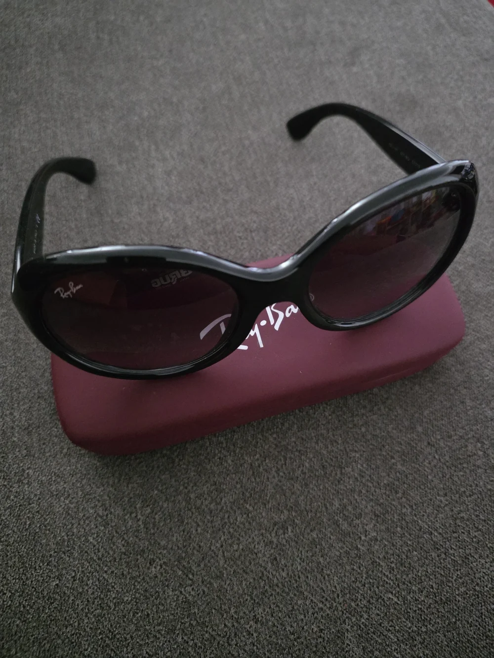 Ray-Ban Women's Black Frame Sunglasses with Purple-Tinted Lenses
